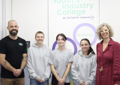 The Principal, three student council members and Nina Taylor MP standing next to each other for a photo